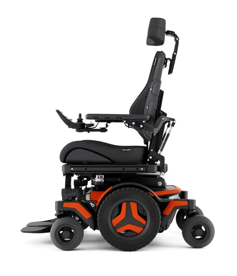 Permobil M3 powered wheelchair with orange wheel accents